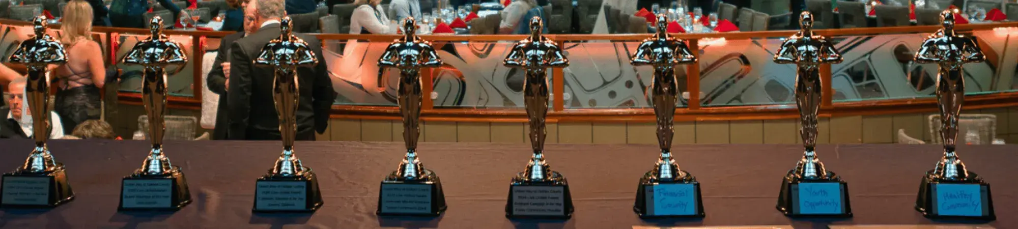A row of awards on a table