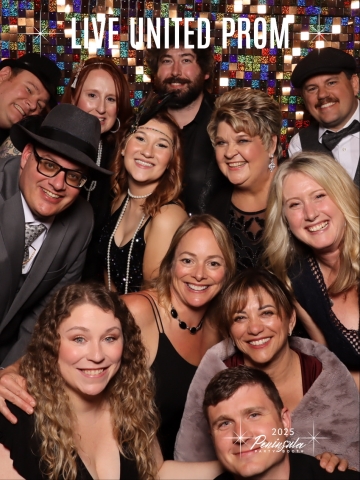 large group of people in a photo booth