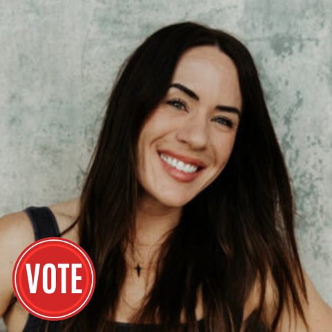 smiling woman with long dark hair