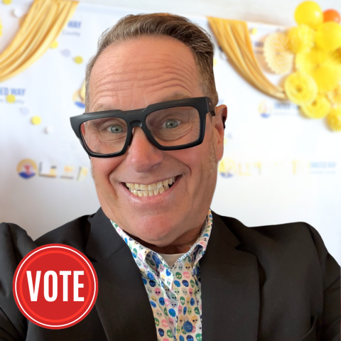 smiling man with glasses