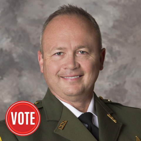 headshot of a man in law enforcement clothing