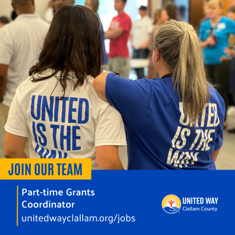 Two people with "United is the Way" on their shirts