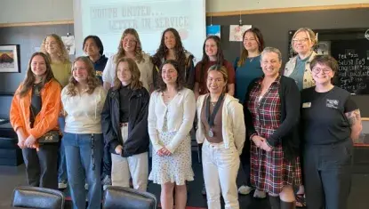 A group of smiling high school students